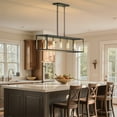 thumbnail image 3 of YANSUN 11.8in 5-Light Matte Black and Gold Modern Farmhouse Rectangular Chandelier, Decorative Lanterns for Lighting Kitchen Island, Dining Room, Living Room, Foyer, 3 of 8