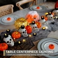 thumbnail image 4 of 24-Pack Halloween Black Dripping Flameless Tea Lights, Battery Operated Flickering LED Candles, Safe for Pumpkins, Party & Holiday Decor, 1.58" D x 1.2" H, Warm White Glow, 4 of 5