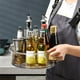 thumbnail image 5 of Estante giratorio de especias | Bandeja de plástico transparente para carrusel para sazonados, botellas, salsas, vinagre, cosméticos | Estante de almacenamiento con divisor giratorio de 360° | 1pc |, 5 of 6