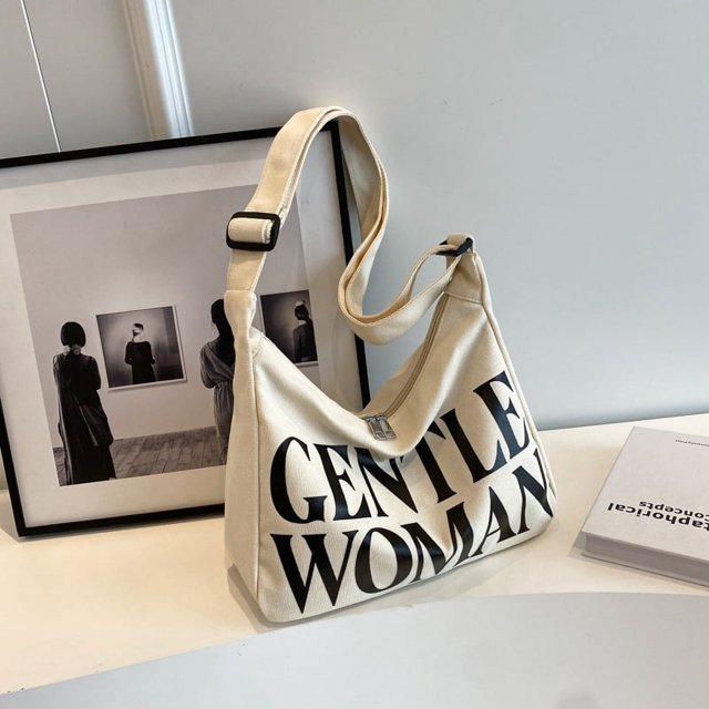 Bolso de lona con estampado de letras de dibujos animados para mujer, de alta gama, tipo bandolera