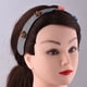 thumbnail image 2 of Diadema ajustable para niños con diseño de cuadros plateados y rojos, ideal para peinar y sujetar el cabello. Incluye accesorios de patrones variados., 2 of 6