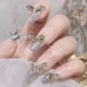 thumbnail image 4 of 12 piezas de diamantes de imitación de aleación con lazo para uñas, kit de lazos para uñas, cristales para uñas acrílicas, joyas, diamantes de imitación, decoración de uñas, 4 of 6