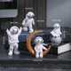 thumbnail image 4 of 4 Piezas Figura de Astronauta Estatua Estatuilla Escultura de Astronauta Juguete Educativo Escritorio Decoración del Hogar Modelo de Astronauta Plata, 4 of 5