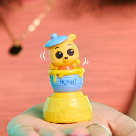 Disney Doorables Micro Motion Capsules, Surprise 1.5-inch Micro Motion Collectible Figurine, Kids Toys for Ages 5 Up