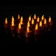 thumbnail image 2 of Juego de 12 velas LED negras a pilas, velas negras sin llama para decoraciones de Halloween, decoraciones de Kwanzaa y detalles decorativos negros para estantes., 2 of 5
