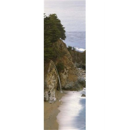 Panoramic Images Rocks on the beach McWay Falls Julia Pfeiffer Burns State Park Monterey County Big Sur California USA Poster Print by Panoramic Images - 12 x 36