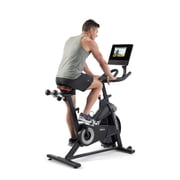 ProForm Carbon Pro10 Studio Bike: Compact Design, 10" Pivoting HD Touchscreen, 22 Resistance Levels, Dual-Sided Pedals, Dumbbells & iFIT Membership for Interactive Workouts, Streaming & More