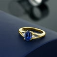thumbnail image 4 of Gem Stone King 18K Yellow Gold Plated Silver Blue Created Sapphire and White Moissanite 3 Stone Engagement Ring for Women | 1.68 Cttw | Oval 8X6MM | Round 2MM | Gemstone September Birthstone | Size 9, 4 of 5