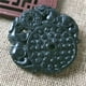 thumbnail image 1 of Jade pendant, made of black ink jade with openwork snake pattern, translucent green under light, magnetic jade., 1 of 4
