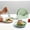 A202, variant on kkbbma under $5 5-Pack Plastic Small Serving Trays with Holder Set - Reusable Serving Platters for Cookie, Appetizer, Charcuterie, Snack, Dessert, Party Food Display