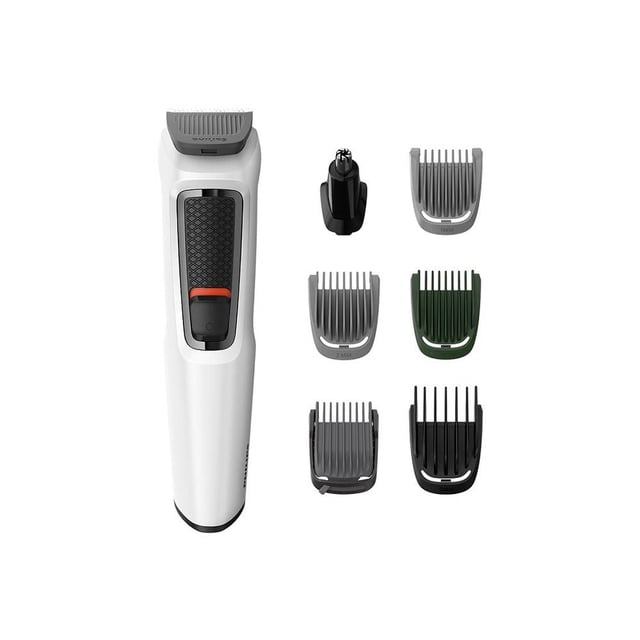 recortador philips de 7 herramientas, recortador blanco frontal con empuñadura texturizada negra y botón rojo, seis peines intercambiables y cabezal para nariz y orejas alineados a la derecha; cuchillas de acero templado visibles y accesorios lavables, ideal también para recorte facial y contornos precisos.