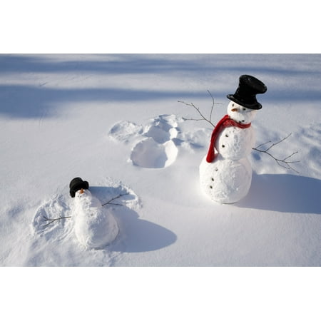 Snowmen In Forest Making Snow Angel Imprint In Snow In Late Afternoon Sunlight Alaska Winter Stretched Canvas - Kevin Smith  Design Pics (8 x