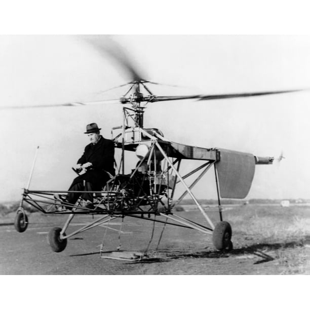 Igor Sikorsky At The Controls Of The Vs 300 Helicopter It Lifts Off The Ground On