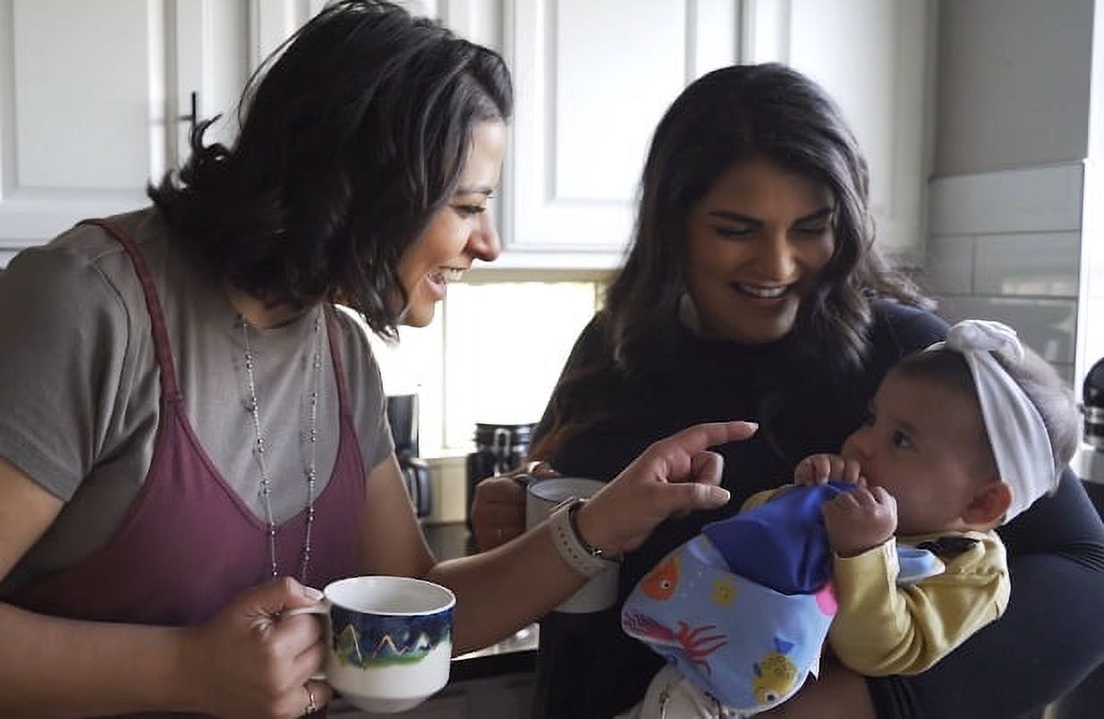 The Bottle Bib -Hands Free Feeding.  Accelerate Baby's Feeding Independence.  Keep Baby  Bottles, Food Pouches and Training Cups, From Falling Onto Dirty Surfaces!  Unisex Patterned Baby Feeding Bib.