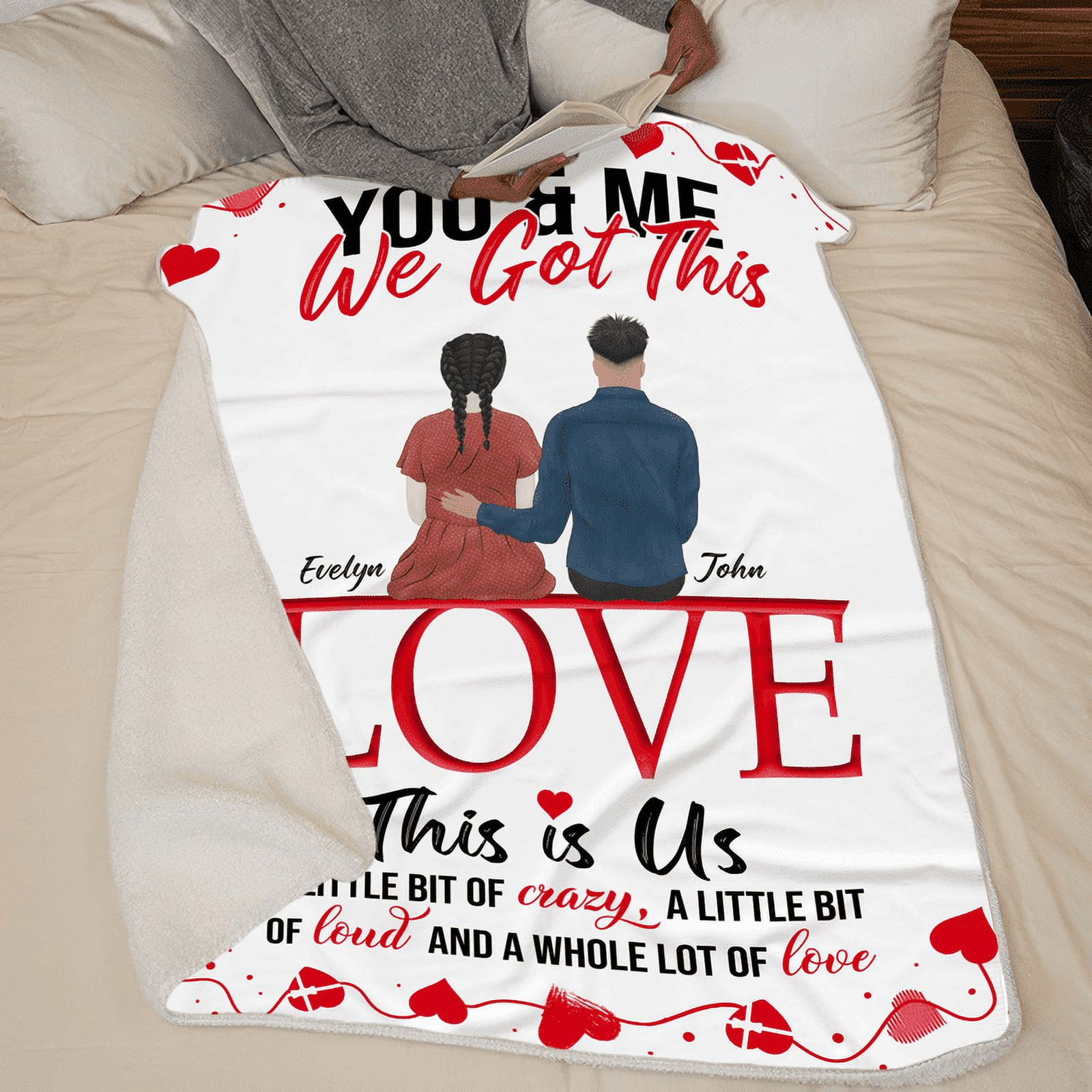Smiling Couple Wrapped Up In Blanket On The Beach Stock Photo - Alamy