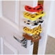 thumbnail image 2 of Topes de puerta a prueba de niños para bebés, 2 uds., protección de seguridad para los dedos, prevención de ruido, Color aleatorio Tan Jianjun unisex, 2 of 2