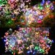 thumbnail image 5 of Guirnaldas de luces navideñas solares para exteriores, 24 M, 240 LED, iluminación de alambre de cobre para exteriores, luces solares de hadas, 8 modos, impermeables, para árboles de Navidad, jardín,, 5 of 8
