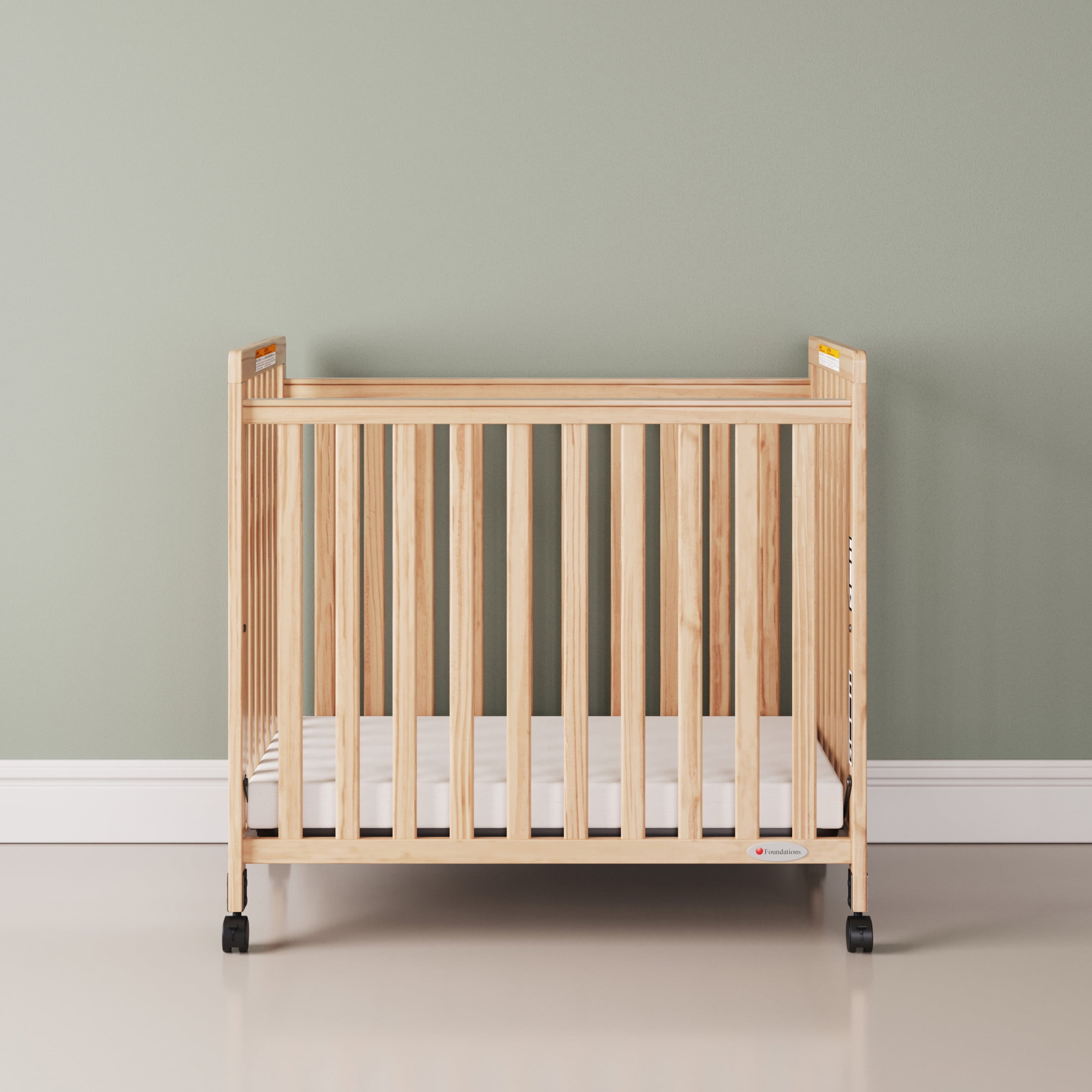 Foundations SafetyCraft Compact Slatted Crib, 3" Mattress Included, Locking Wheels, Natural
