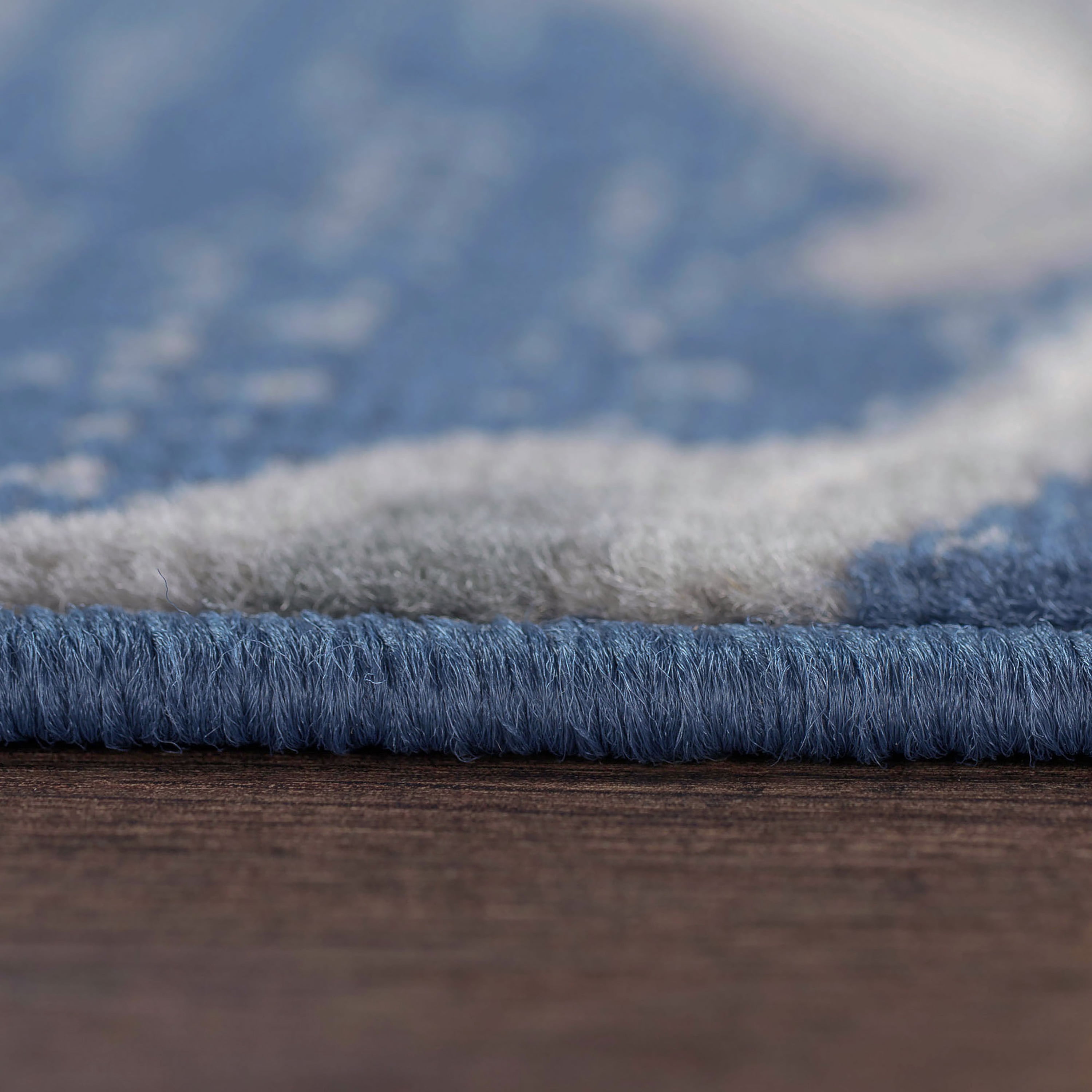 Madison Transitional 9' x 12' Navy and Cream Polypropylene Indoor Area Rug