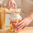 thumbnail image 4 of Plastic Kitchen Storage Container with Measuring Cup Lid, Airtight Dry Food Organizer for Grains and Snacks, Clear Food Storage Box with Capacity Markings, 4 of 8