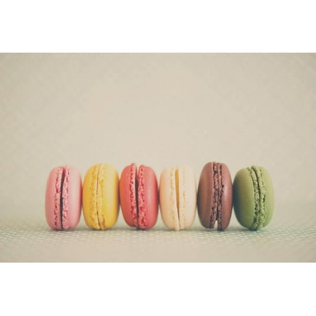 A Rainbow Selection of Sweet French Macarons Sitting in a Row. Print Wall Art By Laura