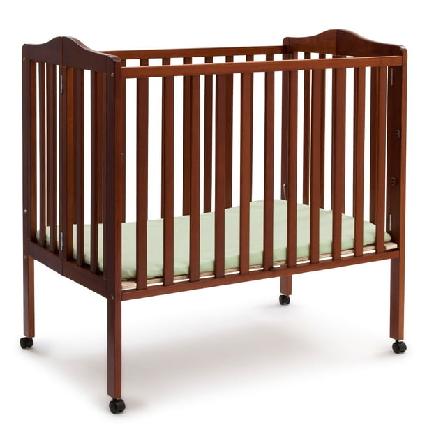 Delta Children Folding Portable Mini Crib With Mattress Cherry
