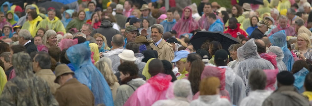 US Senator John Kerry amidst a standing ovation salutes crowd of guests attending the official opening ceremony of the Clinton Presidential Library November 18 2004 in Little Rock AK Canvas Art - Pano