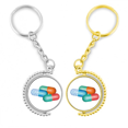 thumbnail image 1 of Productos de cuidado de la salud patrón píldora cápsula Anillo de oro de metal llavero llavero, 1 of 4