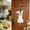 A, variant on Easter Rabbits 2D Wooden Door Sign, 12x7 Inch Hanging Wreath Decor – Floral Bunny Design, for Home, Porch, Garden – Multicolor