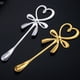 thumbnail image 4 of Billuyoard Mini cucharas en forma de corazón con nudo de lazo, cuchara agitadora de té para postre resistente y duradera, cuchara para postre Mostrada Plata, 4 of 6