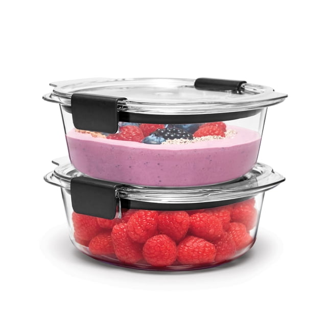 Stacked Rubbermaid Brilliance round food storage containers holding pink berry yogurt and fresh raspberries.