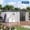 White + black, variant on 12x10 FT Large Outdoor Storage Shed with Pegboard & Solar Motion Sensor Light, Heavy-Duty Tool Metal Shed with Sloping Roof & Lockable Double Doors for Backyard, Patio, Lawn