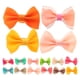 thumbnail image 1 of BRIGHTFUFU 30 Uds. Pinzas para el pelo para perros y gatos con lazo, accesorios para el cabello para el cuidado de cachorros (estilo mixto), 1 of 8