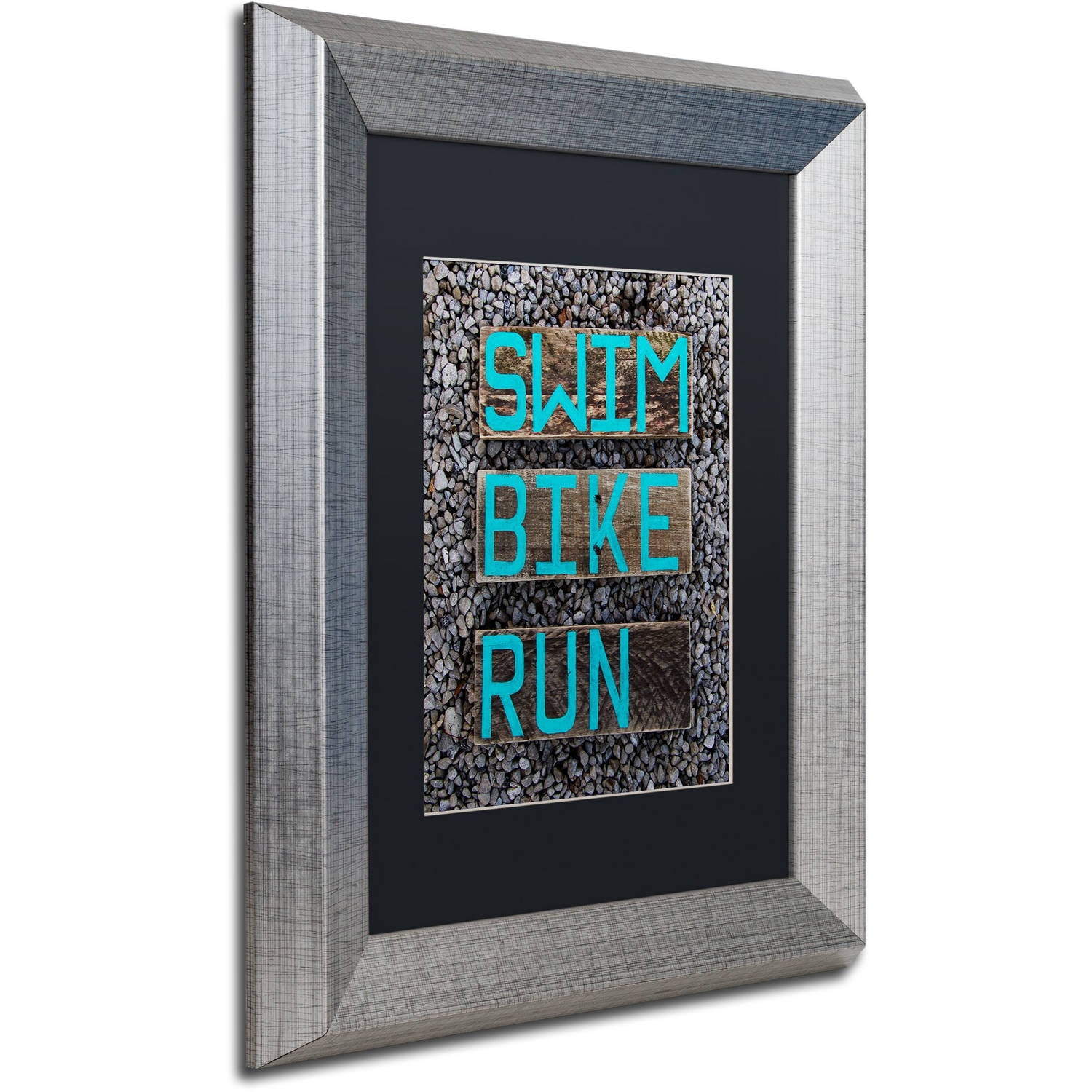 Trademark Fine Art 'The Triathlete' Canvas Art by Nicole Dietz, Black Matte, Silver Frame