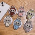 thumbnail image 2 of Soporte de monstruo Labubu de Anime coreano Ins para IPhone, soporte de agarre Tok, soporte de carga inalámbrico magnético de dibujos animados, soport, 2 of 5