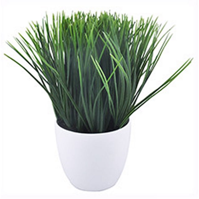 planta artificial decorativa con maceta blanca