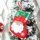 thumbnail image 4 of Medias navideñas (juego de 4): incluye muñeco de nieve, oso polar, Papá Noel y reno, rojo y verde, con detalles en copos de nieve, 4 of 5