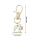 thumbnail image 3 of Mini máquinas de coser llaveros: un recuerdo con significado Llaveros novedosos de metal con forma de máquina de coser. Mini colgantes únicos para mujeres y niñas, para bolsos y bolsos., 3 of 8