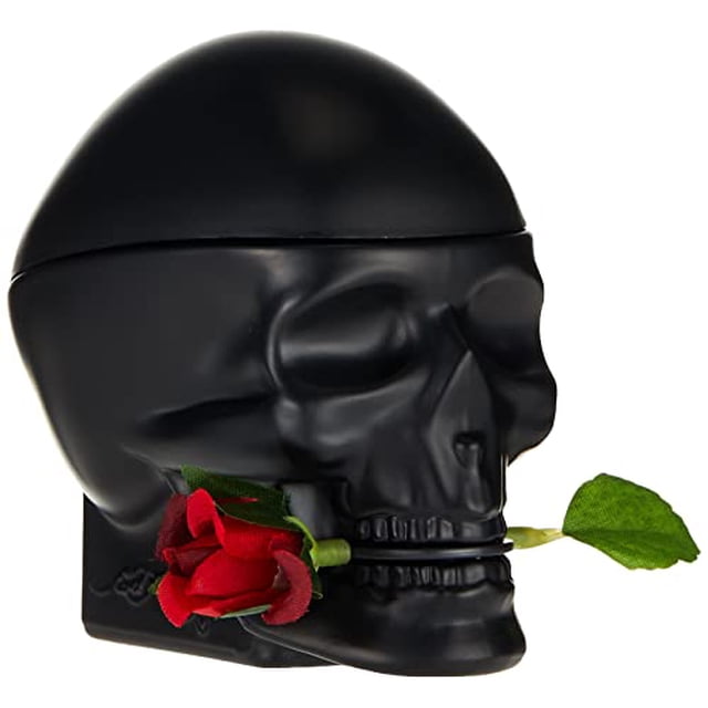 ed hardy skulls & roses eau de toilette for men 3.4 oz - 100 ml - spray botella de perfume en forma de cráneo negro mate, vista frontal 3/4 centrada mostrando la silueta completa; tapa redonda, acabado liso y detalle de una rosa roja con tallo en la boca, formato spray de 100 ml sobre fondo blanco.