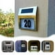 thumbnail image 1 of Luz solar para número de casa | Placa de dirección LED grande de acero inoxidable para montaje en pared | Números iluminados solares para exteriores | Resistente a la intemperie para jardín, calle, 1 of 9