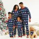 thumbnail image 1 of Conjuntos de pijamas familiares a juego con estampado de Papá Noel y copos de nieve navideños (resistentes al fuego), 1 of 5