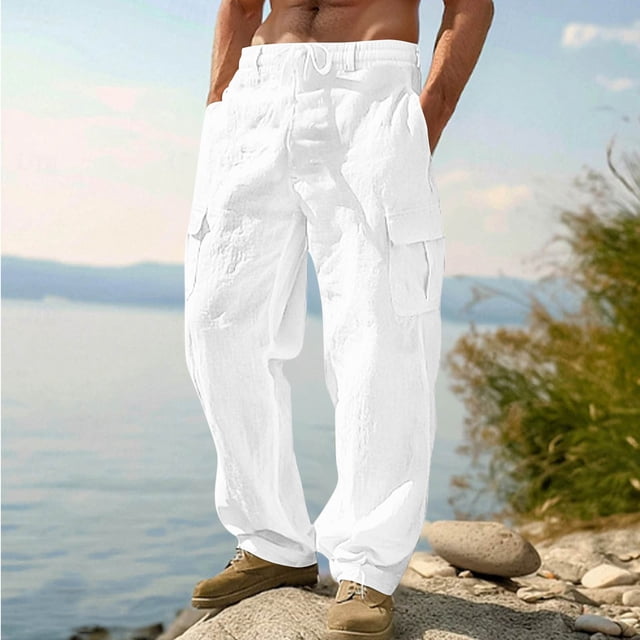 Pantalones largos de poliéster para hombre, de moda, de color liso, con múltiples bolsillos, con cordón y estilo informal.