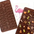 thumbnail image 1 of Juego de 2 moldes de silicona para chocolate y dulces con forma de letras y números, 1 of 5