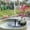 D, variant on Hovilon Solar Floating Fountain Pump with 6 Nozzles and Battery Backup, Automatic Water Circulation for Bird Bath Garden Pond Pool, Weather-Resistant Outdoor Decor, Black, 5.1in