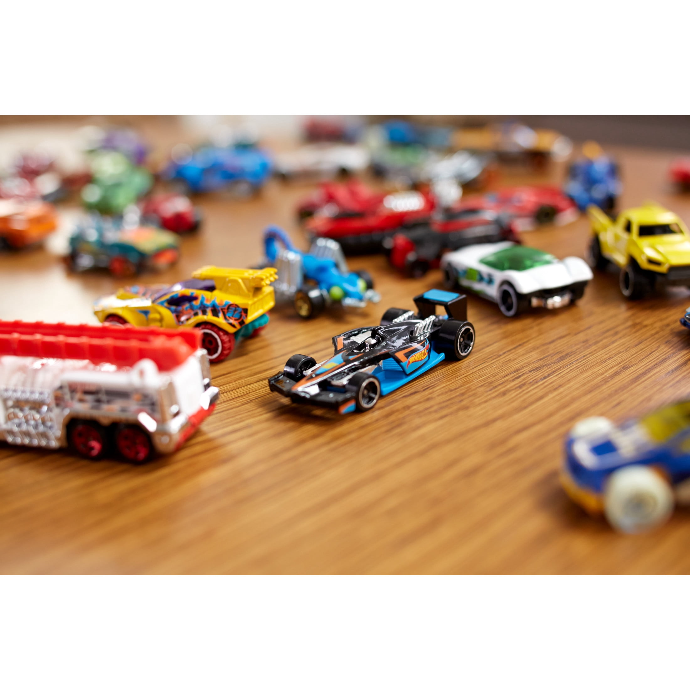 Hot Wheels 40 Pack, Set of 40 1:64 Scale Toy Race Cars, Rescue Vehicles or Trucks (Styles May Vary)