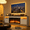 White, variant on Rocyis 70” TV Stand with 3D Realistic Log Flame Electric Fireplace, Entertainment Center for TVs Up to 80-Inch, Modern TV Console with High Glossy Doors & LED Lights, Black