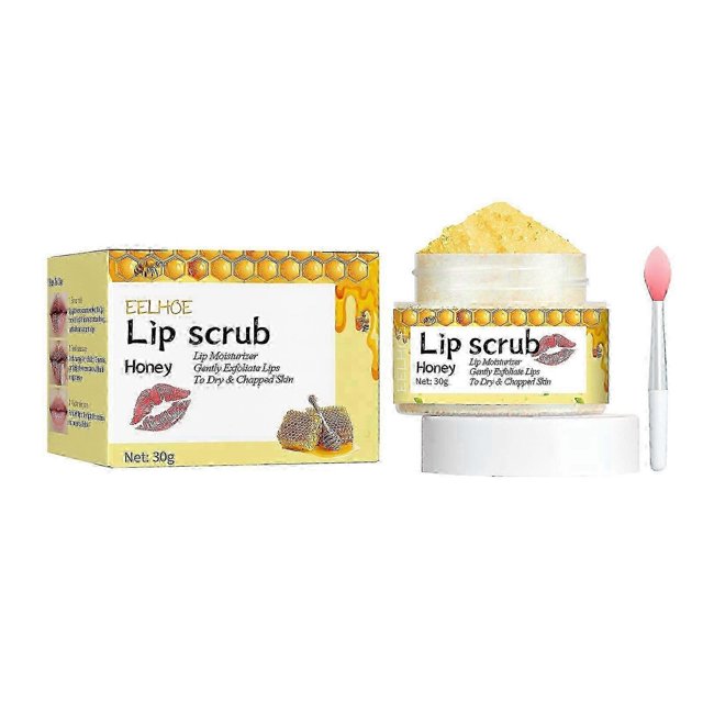 lip scrub cream moisturizing lip anti-chapping moisturizing exfoliating skin magic color fading lip around mouth corner - honey tarro abierto con exfoliante labial granuloso visible, envase redondo transparente con tapa blanca y etiqueta 'Lip scrub Honey', caja amarilla con diseño de panal a la izquierda y espátula aplicadora rosada a la derecha; a menudo usado como aplicador de viaje para cuidado labial.
