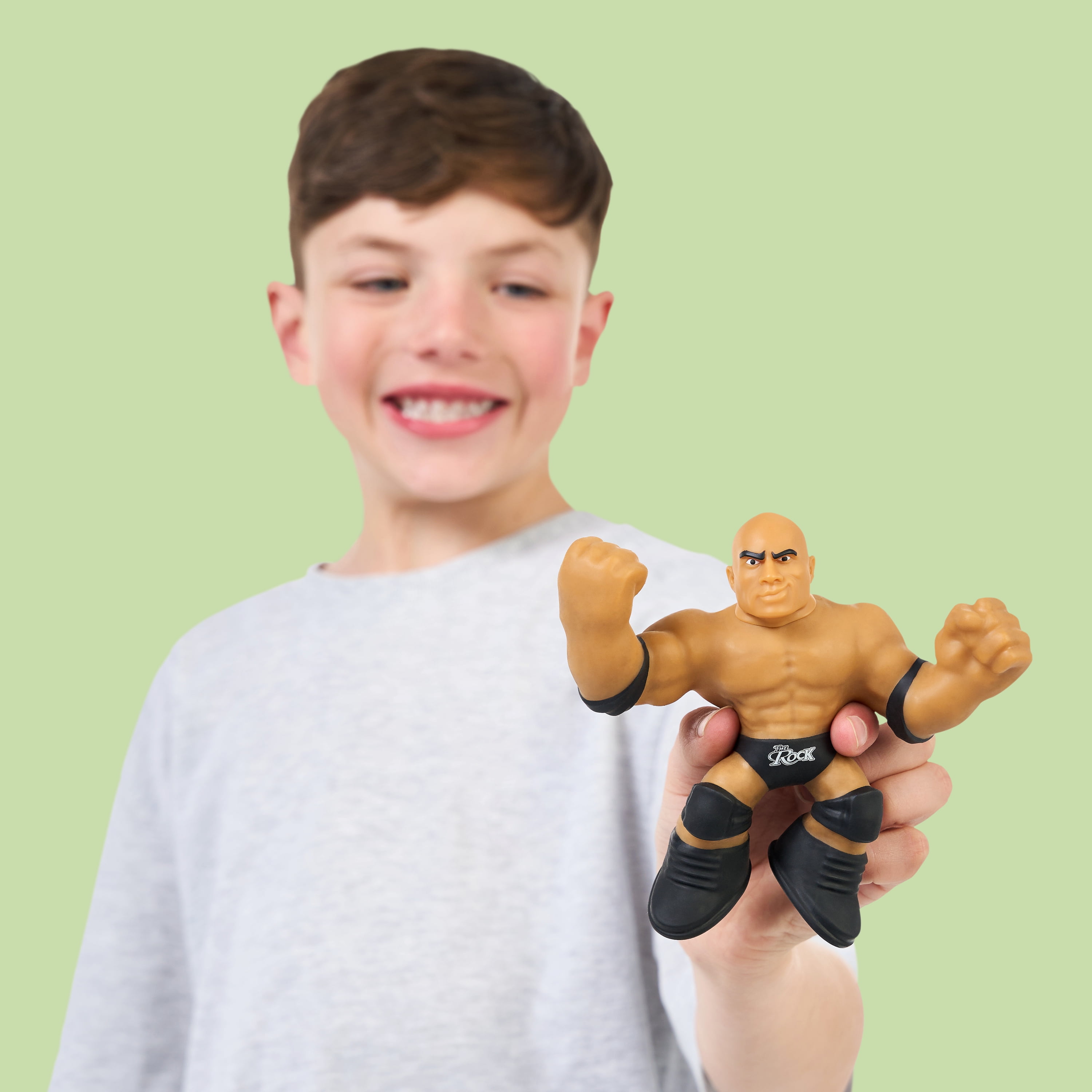 Heroes of Goo Jit Zu WWE Stretchy Superstars The Rock, Stretchy Action Figure, Ages 4+