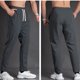thumbnail image 4 of Mens Casual Pantalones Sueltos de Color Sólido Bolsillo Elástico Cómodo Pantalones Deportivos Hombres para Escalada Al Aire Libre Y Uso Diario, 4 of 5