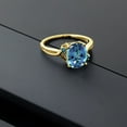 thumbnail image 4 of Gem Stone King 18K Yellow Gold Plated Silver Millennium Blue Mystic Topaz and Blue Diamond 3 Stone Ring for Women (3.03 Cttw, Oval 10X8MM, Gemstone Birthstone, Size 8), 4 of 4